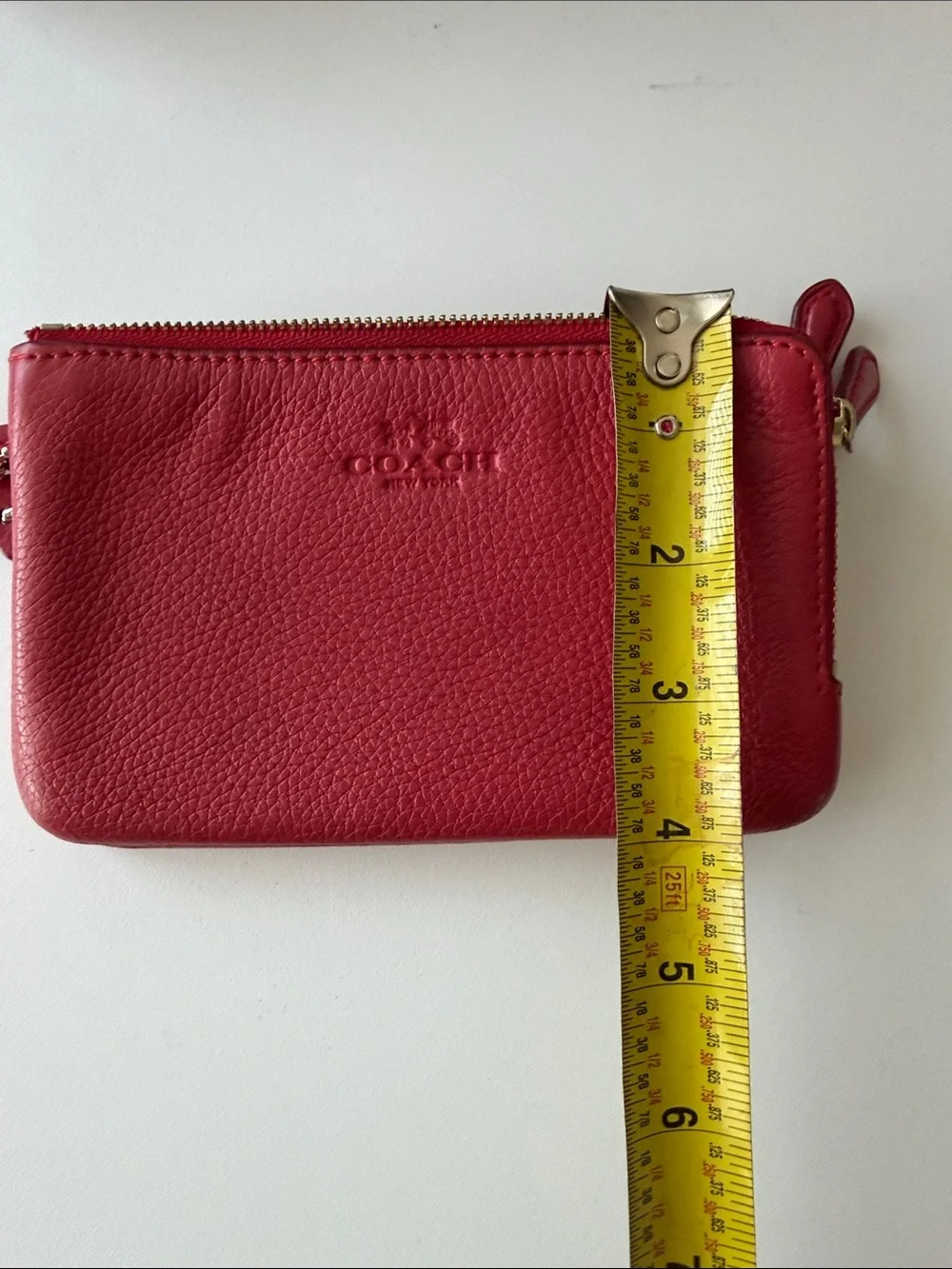 Coach compact pebbled